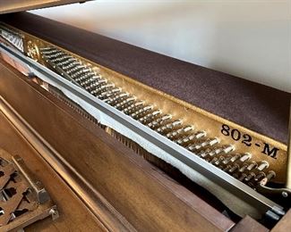 Piano by Kawai - btw the top comes off to give it the same rich sound as a baby grand, but without hogging all the space!  Made in Japan, Circa 1980's Model 202-M