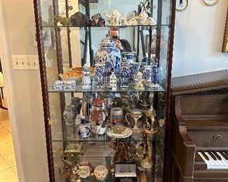 Glass Display Case Filled with Treasures.