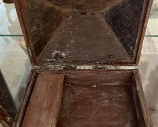 This is a special antique box with brass hardware.