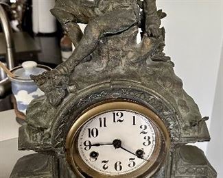 Extremely unusual Mantle Clock.  the Clock body is Cast Iron with an opening cover for Clock.  Revolutionary Soldier on top of clock 