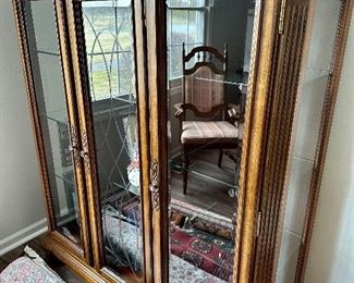 3 Door Display Cabinet with Glass Shelves in Excellent Condition.