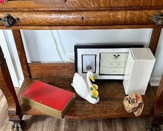 Check out this spectacular table.  The  lion heads and clawed feet make this antique a real collector’s ptece  and conversation table!  Perfect for a hall/Entry, Buffet or even Antique Bar.