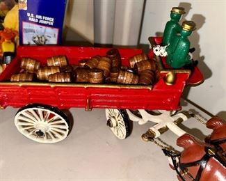 Full of kegs - look at the bottles posing as wagon drivers!Horse drawn wagon! Clydesdale Horses.  Cast Iron Toy.