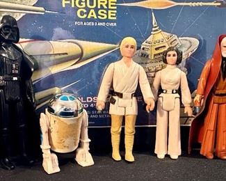 Original 1977 Figures including Left to Right: Darth Vader, R2D2, Luke Skywalker, Princess Leia and Obi-Wan