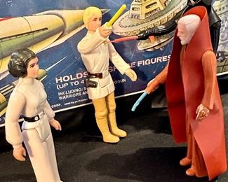 Original 1977 Figures including Left to Right: Darth Vader, R2D2, Luke Skywalker, Princess Leia and Obi-Wan