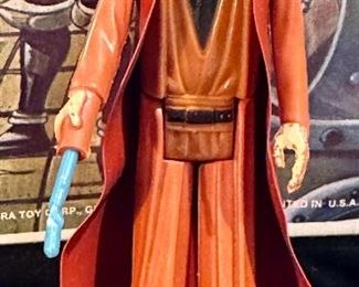 Original 1977 Figures including Left to Right: Darth Vader, R2D2, Luke Skywalker, Princess Leia and Obi-Wan