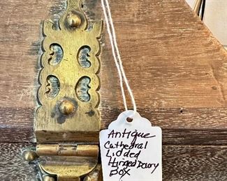 This is a special antique box with brass hardware.