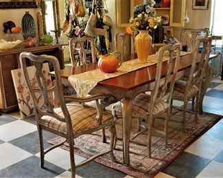 Italian Dining Table with 2 leaves to make it extra long and 6 chairs. With the 2 leaves in, it can seat 10 people.