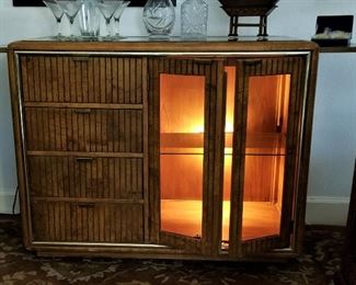 Vintage mid-century modern cabinet/server/console/lighted and on wheels with sides that pull out