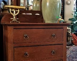 Child-size vintage dresser with mirror. Great to store items in a smaller space.