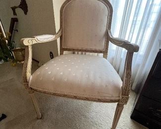 Living Room
Ethan Allen French arm chair covered in cream silk.
