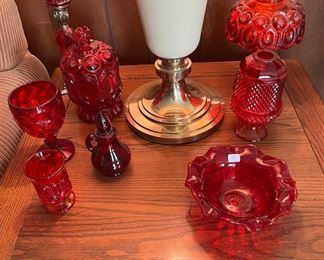 A collection of red glass, Fostoria, Smith Moon and Starrs and more. 