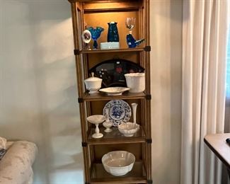 Dining Room 
A cabinet full of Lenox, Delft, framed Asian fan and Midcentury blue glass 