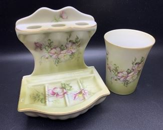 (2) Antique Nippon Hand Painted Bath Vanity Set:
Cup and Combined Soapdish with attached Toothbrush Holder
Porcelain from Japan late 19th - early 20th Century