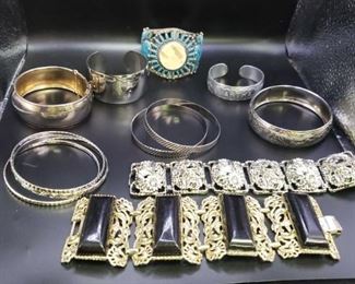 Silver Toned Bangles And Bracelets