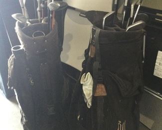 Assortment Of Golf Clubs And Two Bags
