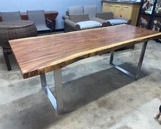 live edge table at  Orlando Estate Auction 