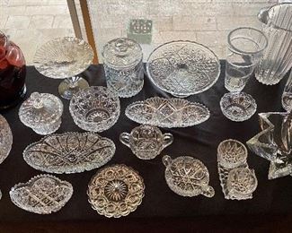 Glass & crystal collection including a few American Brillant pieces. Beautiful biscuit barrel , serving bowls & vases. 