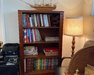 Classy little bookshelf & cook book collection!! 