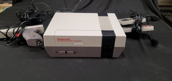 https://www.auctionninja.com/hewitt-estates-and-antiques/product/vintage-nintendo-original-nes-system-with-accessories-1391.html