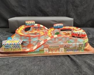 https://www.auctionninja.com/hewitt-estates-and-antiques/product/1960s-marke-technofix-tin-coney-island-roller-coaster-toy-1388.html