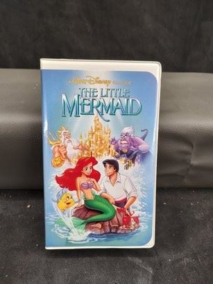 https://www.auctionninja.com/hewitt-estates-and-antiques/product/little-mermaid-black-diamond-edition-clamshell-vhs-tape-banned-cover--1373.html