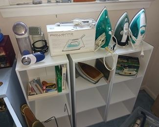 Sewing supplies and modern clothes iron