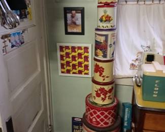 Vintage tin canisters advertising large canister