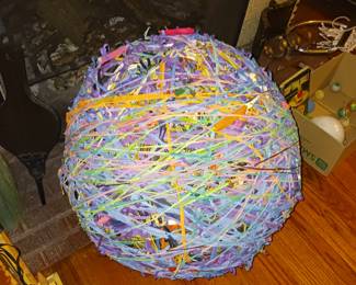 24-in diameter ball of rubber bands. Probably weighs 30 lb