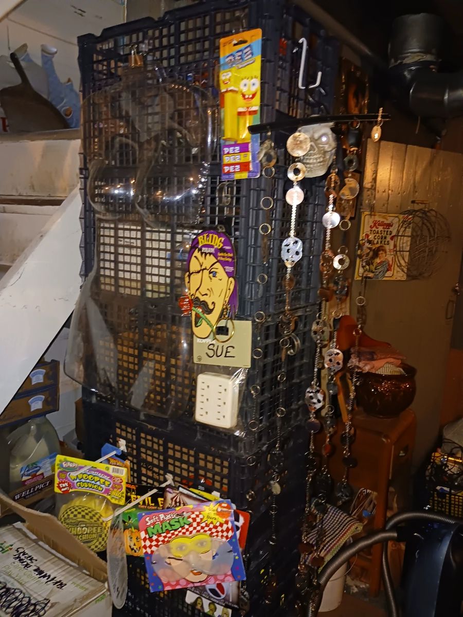 Tons of Halloween scary masks memorabilia toys and decorations