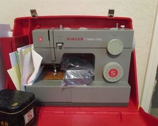Singer heavy duty sewing machine in case