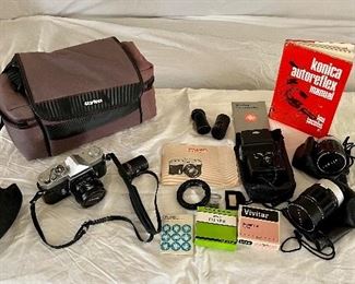 Konica 35mm Camera with 3 Lenses and Vivitar electronic flash
Manuals and accessories included