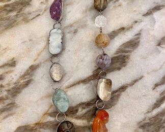 Vintage Rebecca Collins carved and cabachon stone necklace with angel clasp.  This piece is unsigned…but Janelle called Rebecca and she said it was hers.