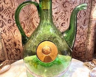 This is so fun!  This is a vintage wine cooler with brass fittings and a “belly” to hold ice to keep your wine cold.  Everyone needs this!
