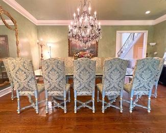 There are (10) custom side chairs and (4) armchairs