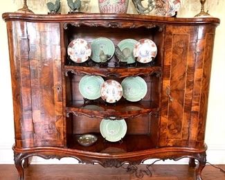 Antique sideboard, Oriental celadon and Imari plates