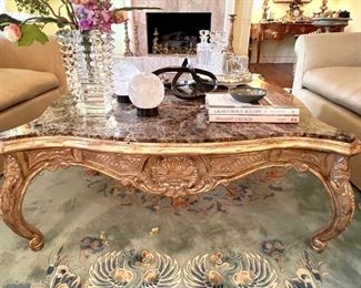 Carved square  gilt coffee table with marble top