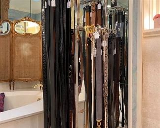 Designer men’s and women’s belt - located in the huge main bathroom upstairs - Prada, Judith Leiber, Escada, Etro, crocodile, western, sterling buckles.  So many belts!