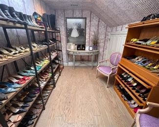 THE SHOE ROOM!  I can’t even say enough about all the true designers in this room! This upstairs room is filled with heels, mules, sandals and boots.  The Main Bedroom Ladies Bathroom has the flats.  