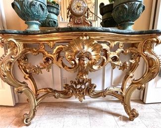 Ornate French gilt console table with 4 legs