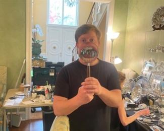 An amazing magnifying glass with sterling handle.  You will be able to read anything with this!  Haha!