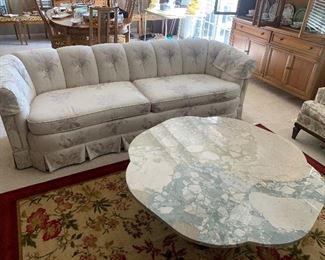 Elegant sofa, very attractive marble coffee table