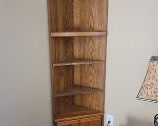 One of a pair of corner cabinets