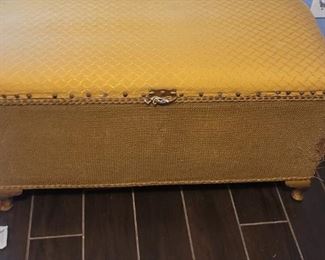 One of two fabric covered storage chests