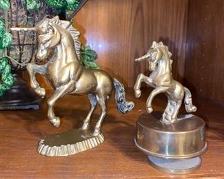 Doesn’t everyone need a brass unicorn? The one on the right is a music box and it works.