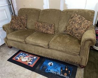 This sofa is in good structural condition but could use a good cleaning 