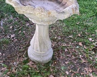 This 2 piece concrete bird bath would be perfect among your spring flowers