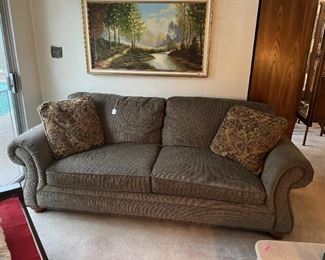 This is one of the sofas available in the sale.  Note the framed artwork, too.