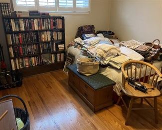 There is a bed hiding under the bedding and behind the chest (Hope or Cedar?  Maybe both.  Come find out!)  Also, come see the books.