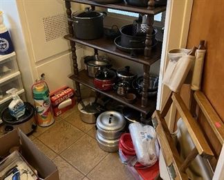This is a selection of the cookware in the sale.  Folded up is the director's chair, leaning against the right side.